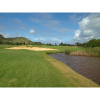 The 452-yard sixth hole on the Arnold Palmer Course at Turtle Bay Resort features water down most of the right side.